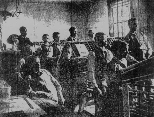 Photo of the composing department of the Planet