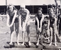 Girls ready to dive at public pool in Arlington